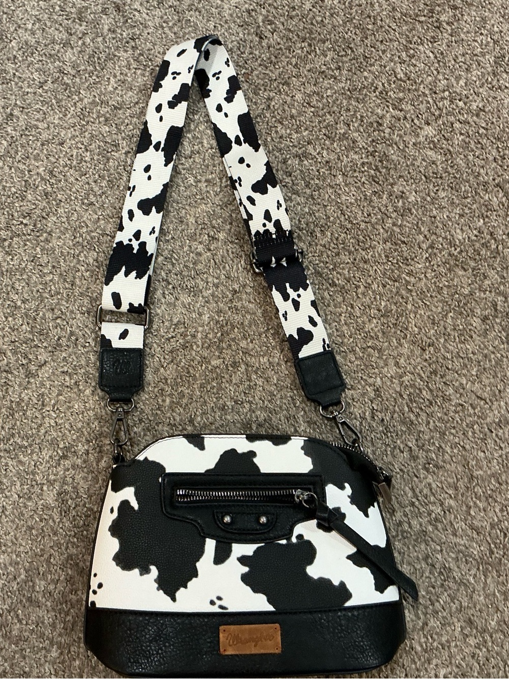 Wrangler Black & White Cow Print Crossbody Bag with Patterned Strap